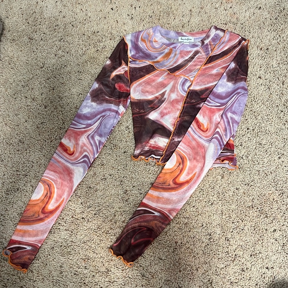 see through long sleeve crop top multicolored size xxs but fits like an xs.